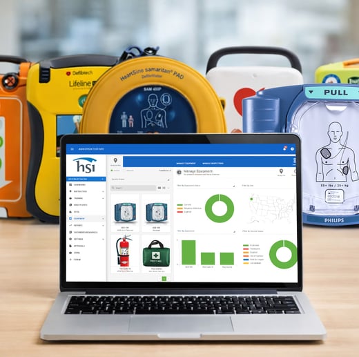 AED equipment manager laptop on desk with AEDs_square